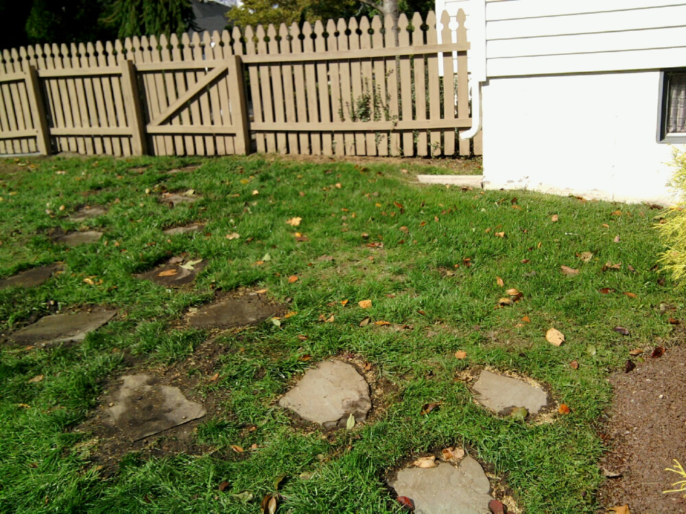 Soaking and Seeding the Flagstone Walkway