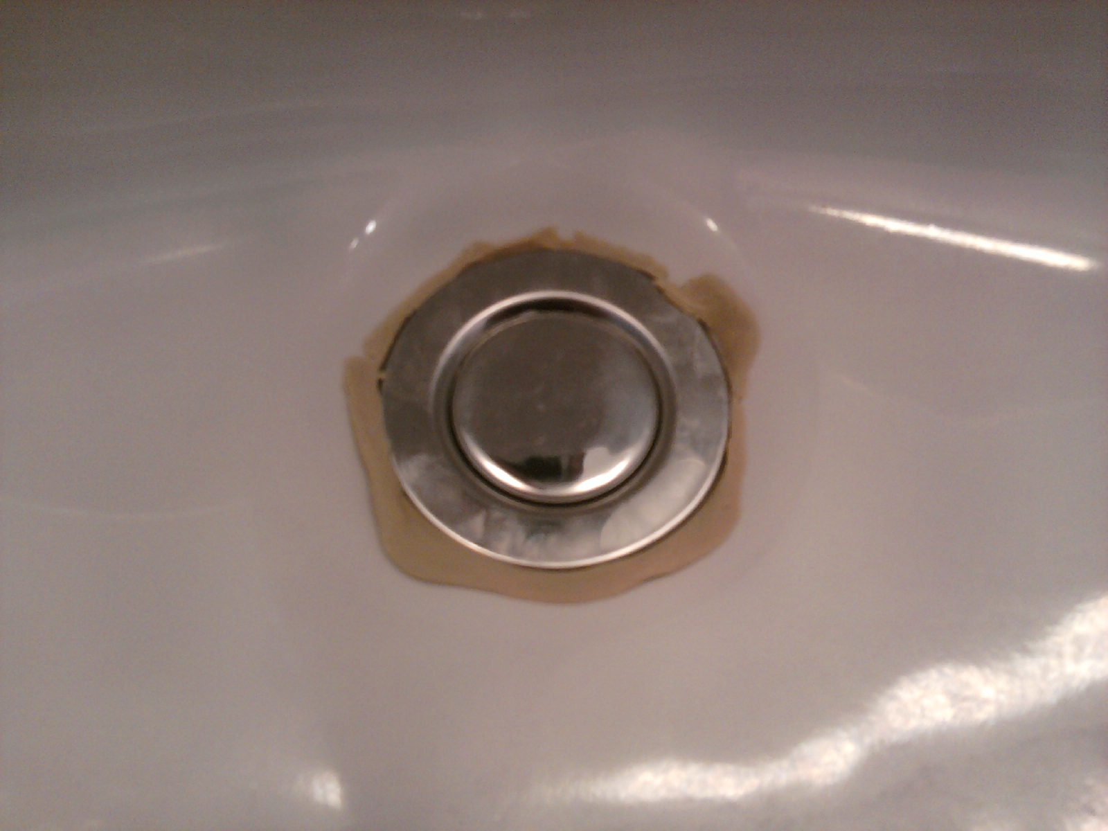 Excess Putty Should Be Seen All-Around Drain