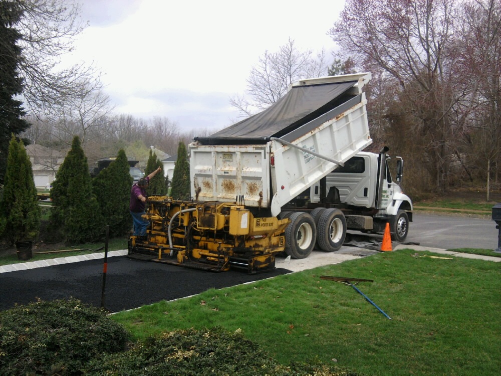 Dump Truck and Asphalt Paving