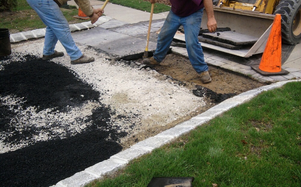 Removing Asphalt by Paver Apron