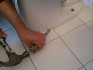 Removing the Old Bath Toilet Caulk