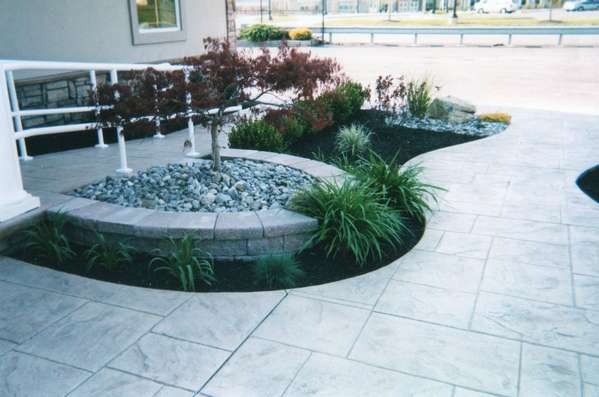 Decorative Stone with Japanese Maple in Landscape Bed