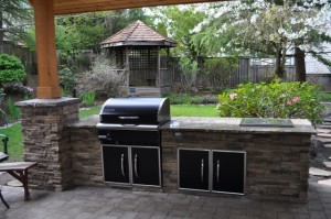 Outdoor Kitchen Design Cultured Stone Traeger BBQ Island