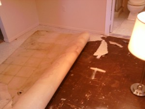 Decrepit Vinyl Flooring Over Old Tile