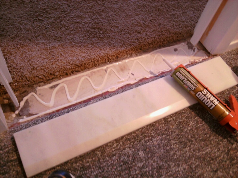 Marble Threshold to Subfloor Construction Adhesive