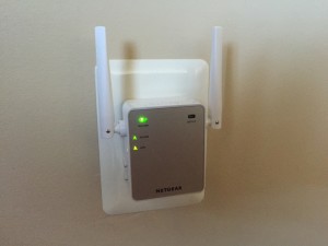 WiFi Extender Plugged Into Home Electrical Outlet