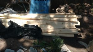 Easy DIY Playhouse Pile of Lumber