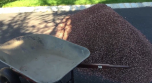 Barn Red Landscape Stone and Wheelbarrow